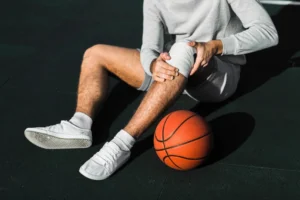 Athlete recovering from injury with supportive care