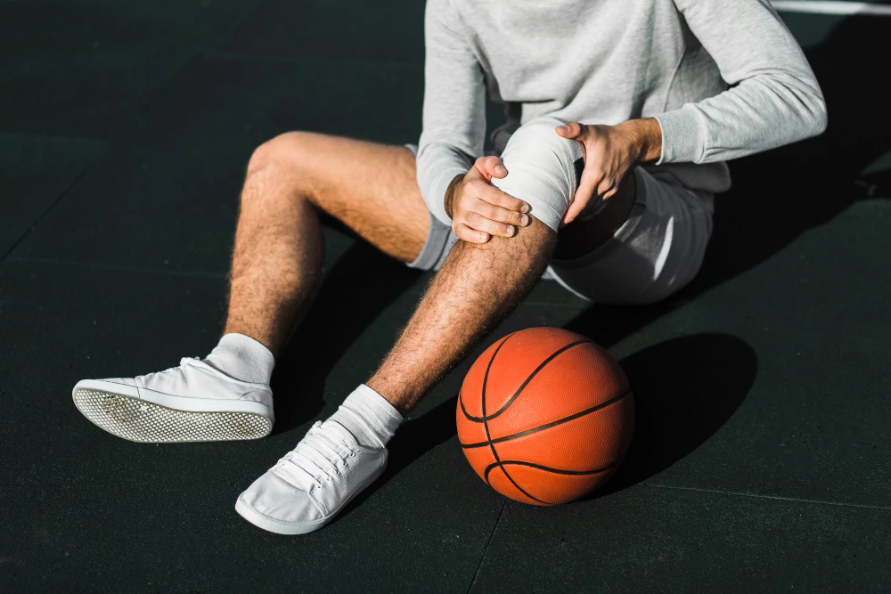 Athlete recovering from injury with supportive care