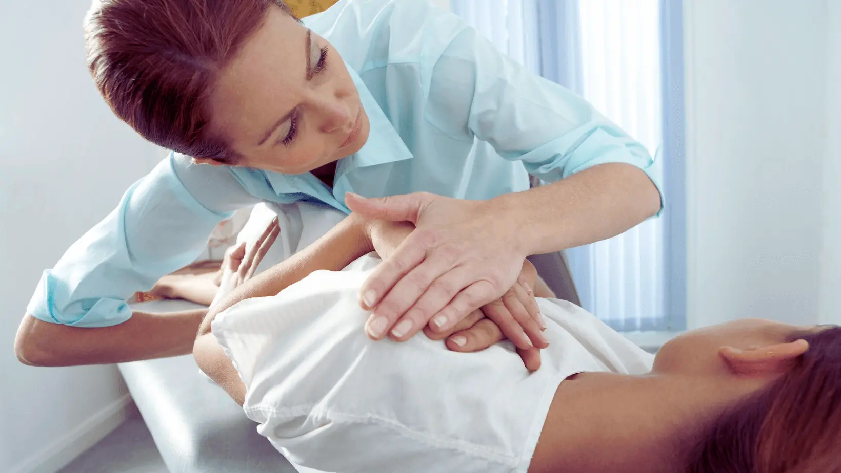 Chiropractor providing an adjustment