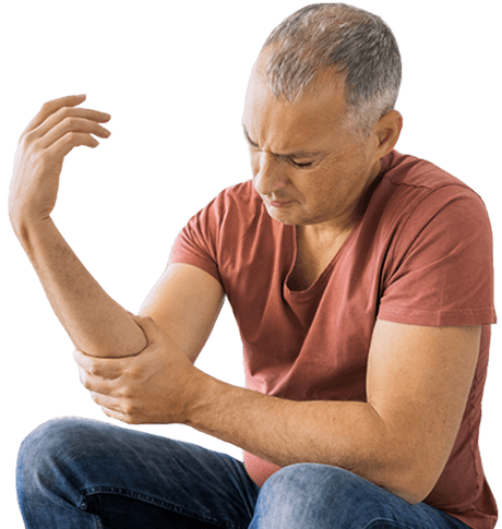 Man facing down, holding sore elbow